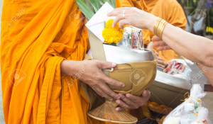 Buddhists have faith in Buddhism. giving alms to monks receive alms