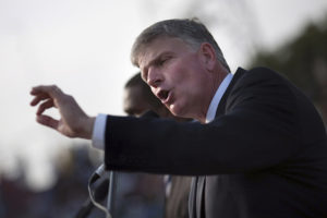 (RNS1-may20) Franklin Graham, son of evangelist Billy Graham, addresses the crowd at the Festival of Hope, an evangelistic rally held at the national stadium in Port-au-Prince, on January 9, 2011. Photo courtesy of REUTERS/Allison Shelley *Editors: This photo may only be used with RNS-FRANKLIN-GRAHAM, originally transmitted on May 20, 2015.