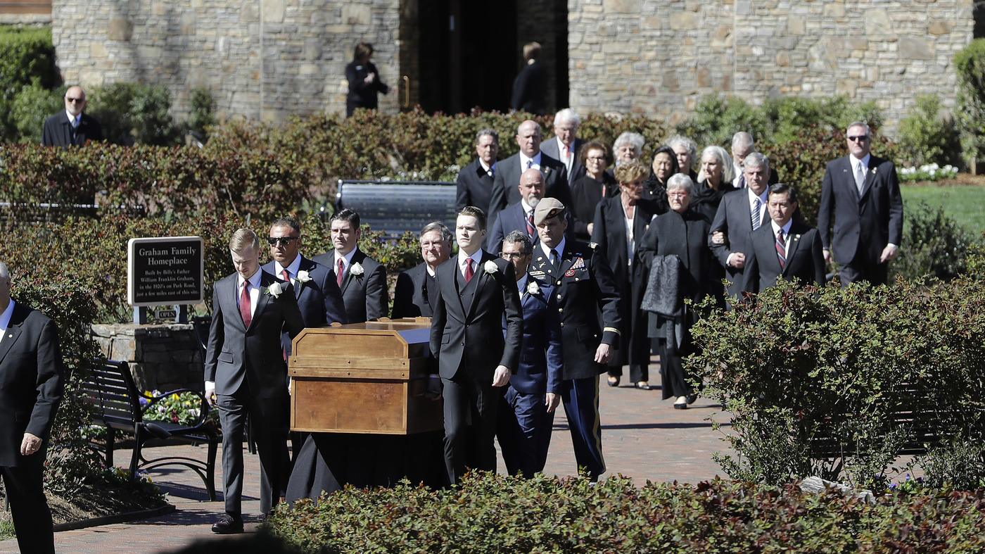 The casket of the Rev. Billy Graham is moved during his funeral service at the Billy Graham Library on Friday in Charlotte, N.C.